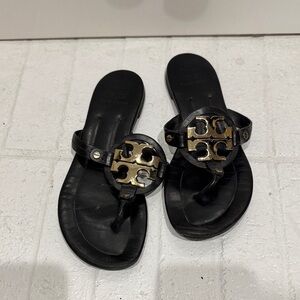 Tory Burch Black Sandals with Gold Accents